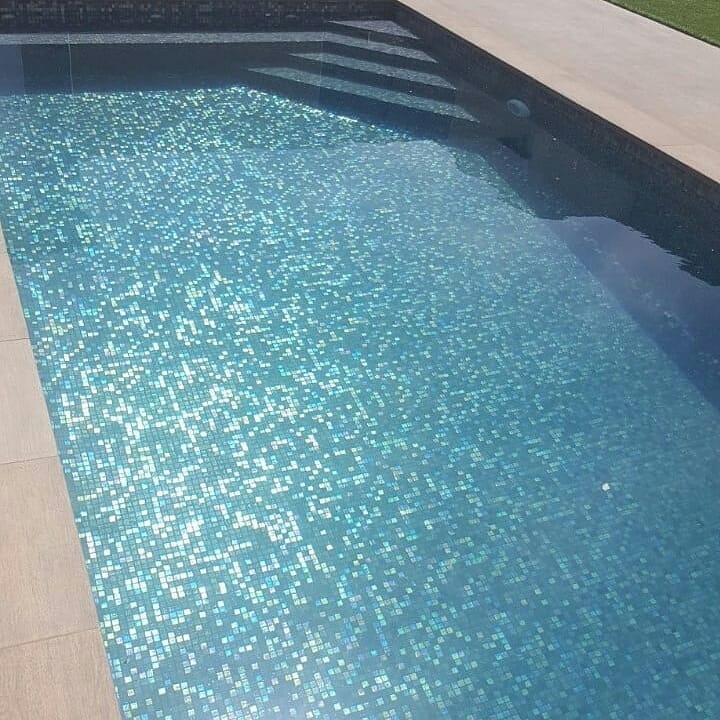 Pool with shimmering iris mosaic tile finish